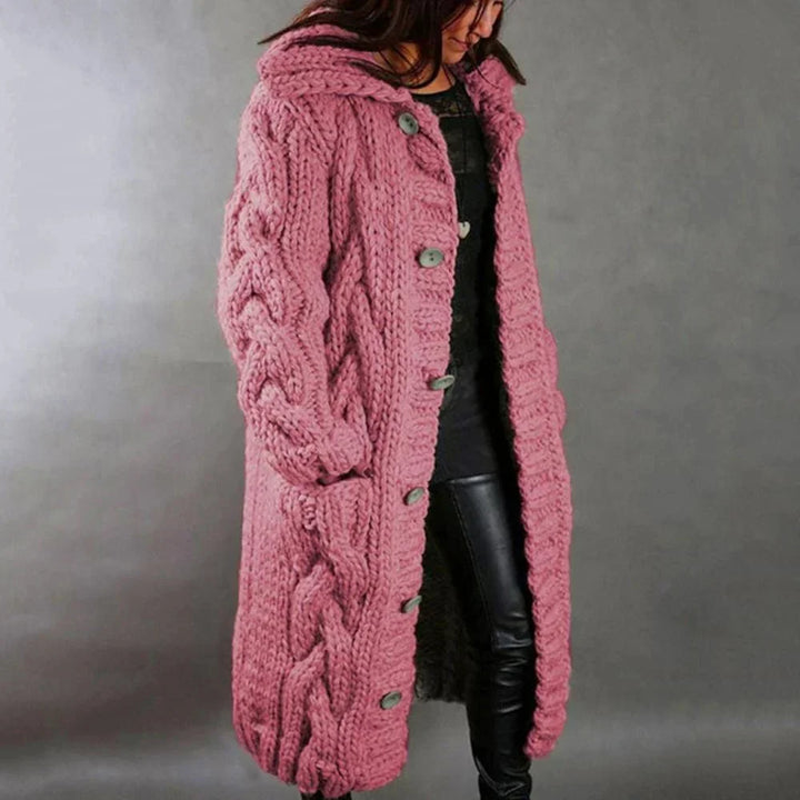 Stylish women's cable knit maxi cardigan, providing a warm, cozy & elegant layer for fall and winter fashion.