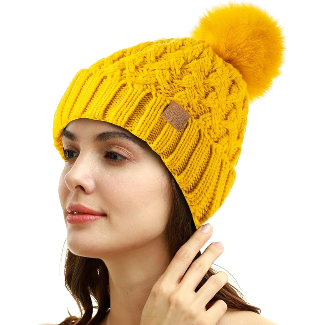 Women's warm knit pom beanie hat in Yvonne style, perfect for winter warmth and fashion.