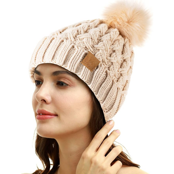 Texture shot of the high-quality yarn used in the Yvonne women's knit pom beanie hat.