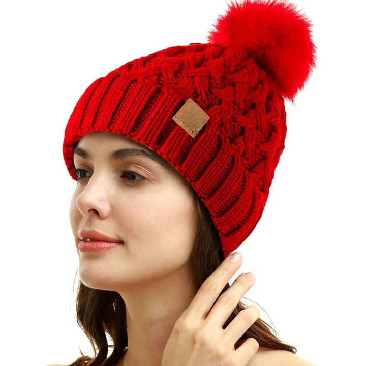 Side view of a cozy Yvonne winter beanie, showcasing its thick knit and fleece lining for warmth.