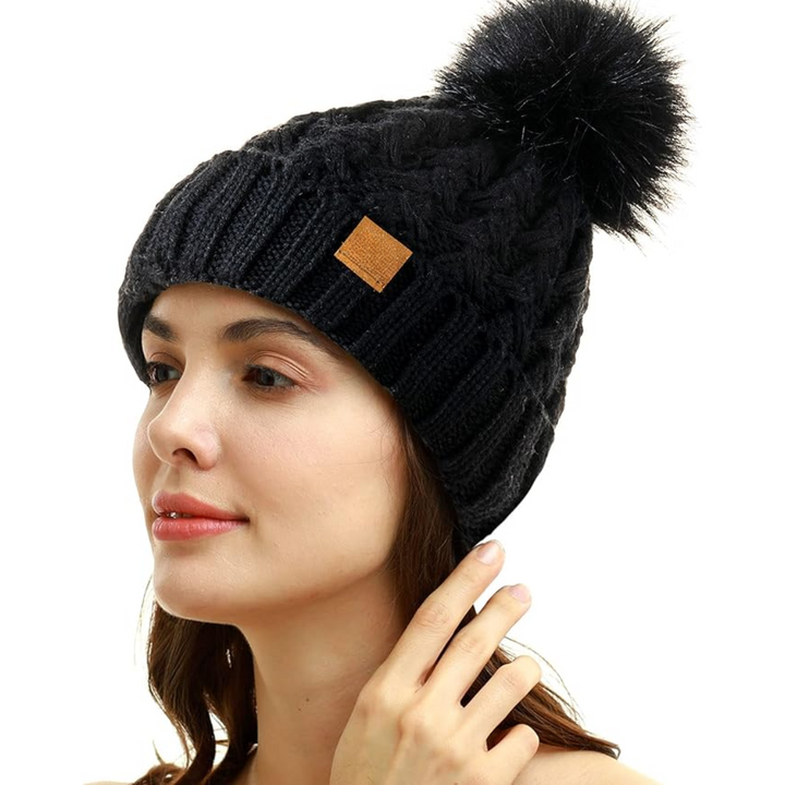 Collection of Yvonne warm knit beanies in assorted colors, perfect winter headwear options.