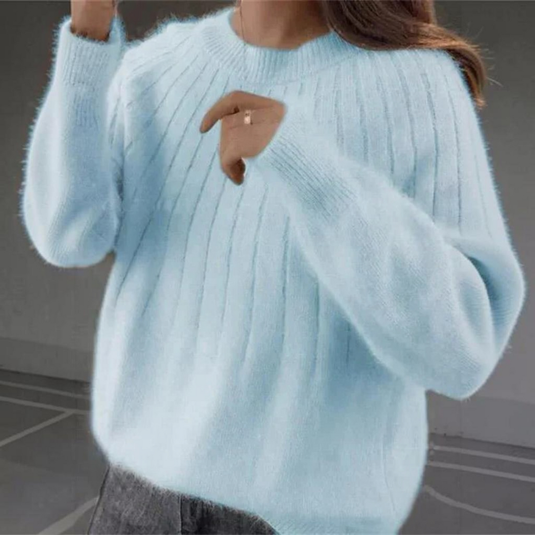 Cozy knit women's sweater, a soft cashmere top ideal for fall attire and comfortable everyday wear.