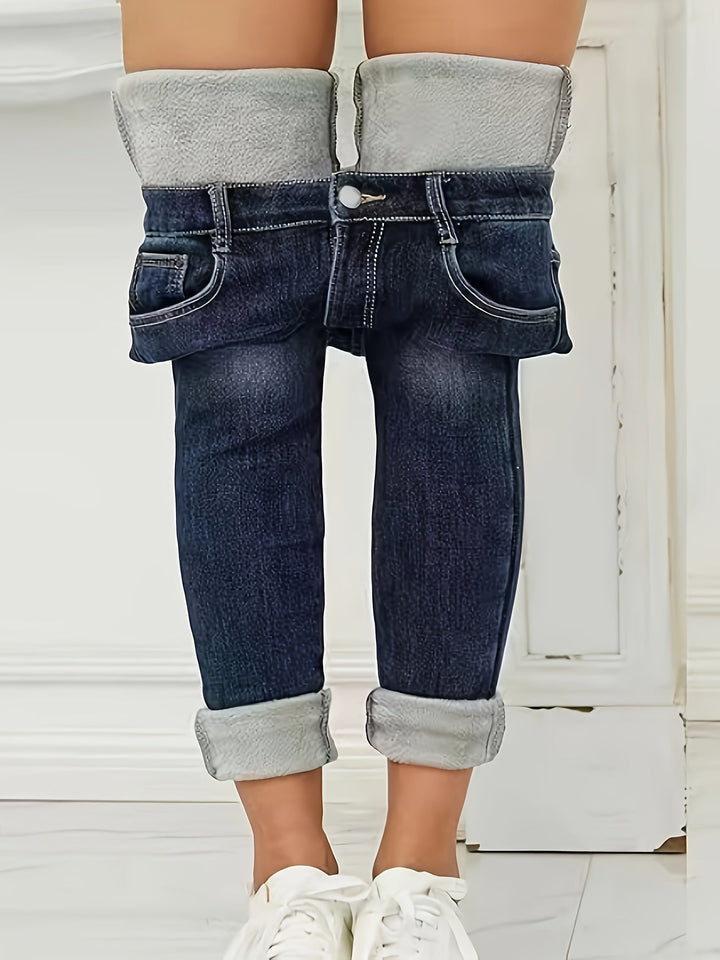 Women's high waist warm lined skinny jeans. Enjoy cozy comfort & stylish everyday wear in cold weather conditions.