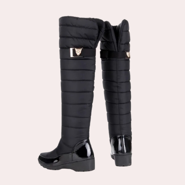 Stylish women's tall boots for winter. These elegant over-the-knee boots offer warmth and comfort.