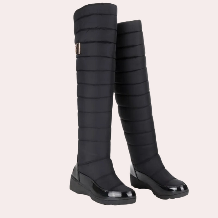 Classic black over-the-knee boots for women. Stay warm and chic with these comfortable winter fashion boots.