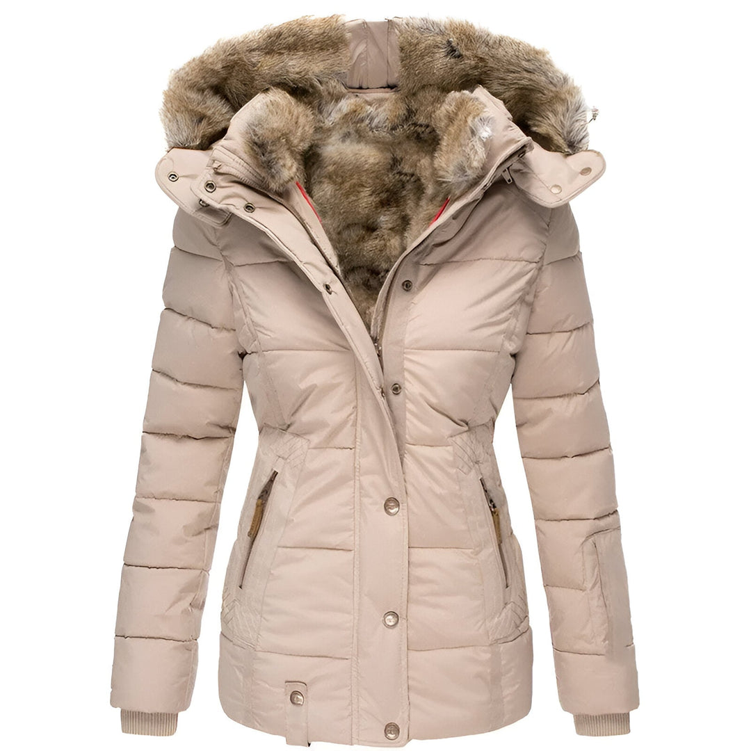 Cozy women's puffer coat, quilted & hooded, providing ultimate warmth for cold winters.