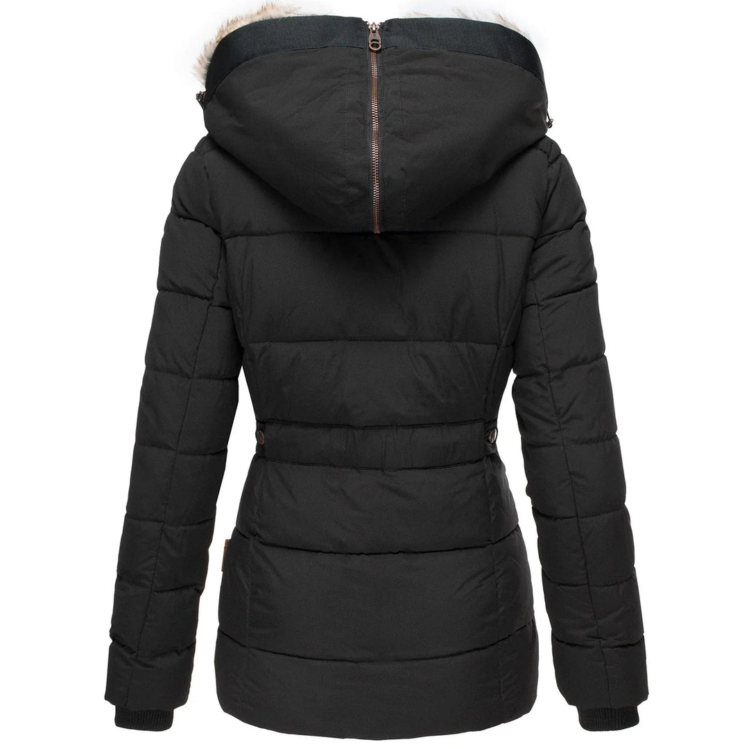 Stay warm with this women's quilted hooded puffer jacket, designed for harsh winter conditions.