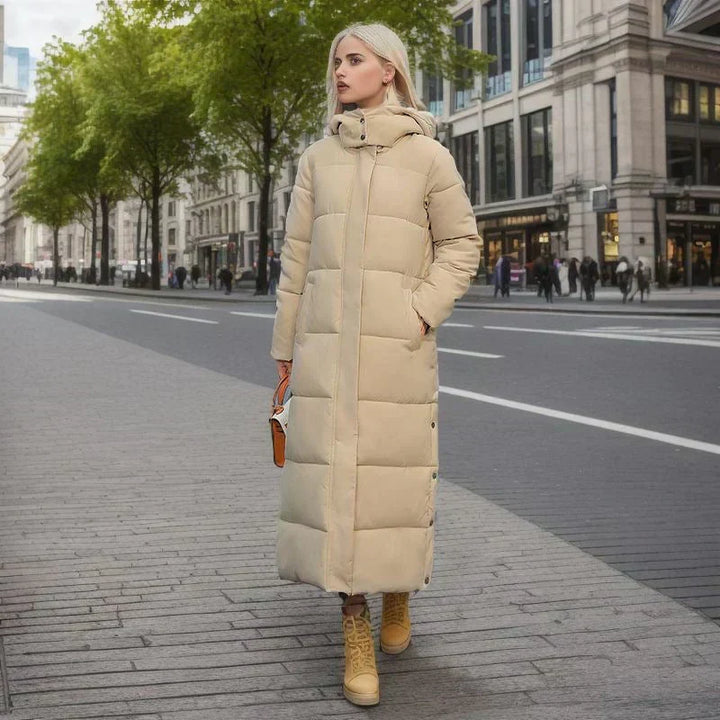 Cozy women's long winter coat, perfect for staying warm in cold weather.