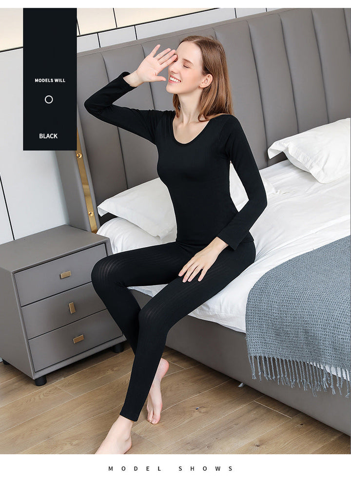 Women's thermal underwear set, black, featuring a long-sleeve top and matching leggings for cold weather