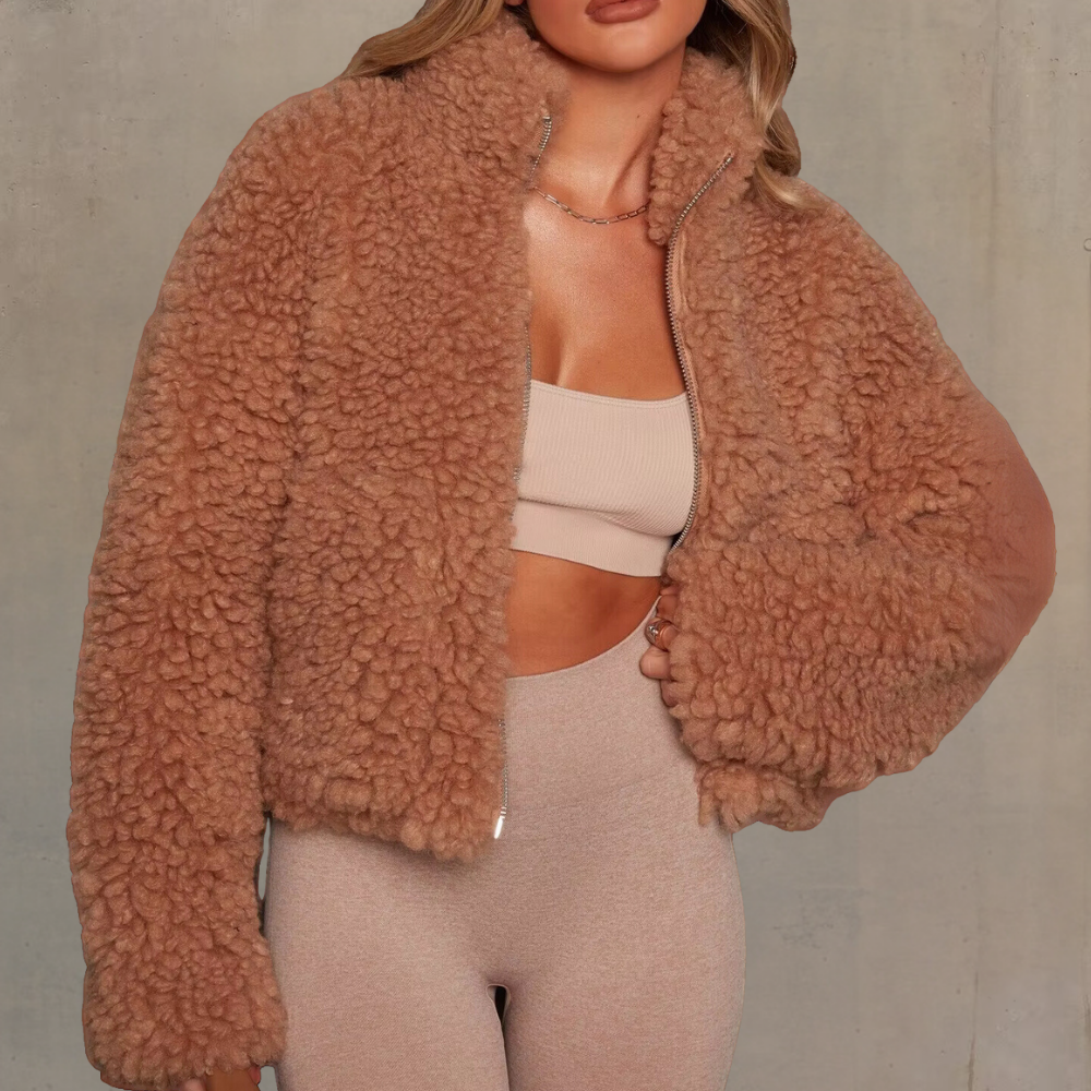 Luxurious soft velvety women's winter coat. Warm long-sleeve jacket, perfect for chilly days & stylish outerwear.