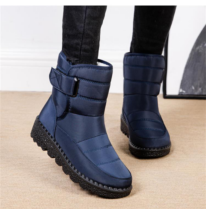 Plush warm lining of women's padded waterproof winter boots, designed for ultimate comfort in cold weather.
