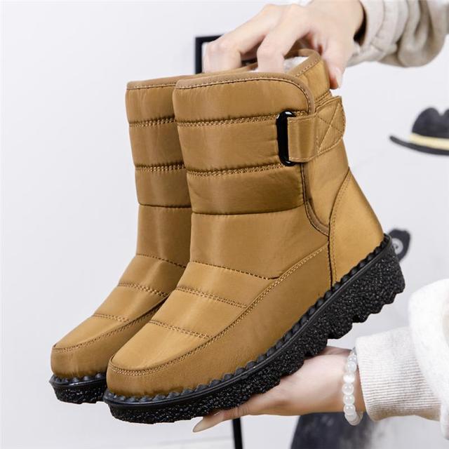 Durable non-slip sole on women's waterproof winter boots, providing secure traction on ice & snow.