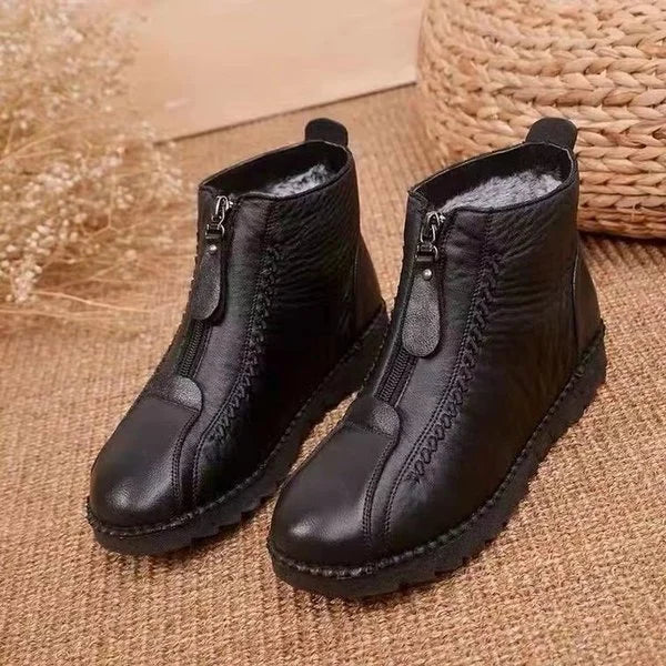 Stylish black women's winter ankle boots with practical side zipper, cozy and fashionable for daily wear.