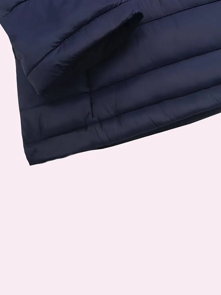 Fashionable ladies puffer jacket with hood, lightweight design for ease of movement.
