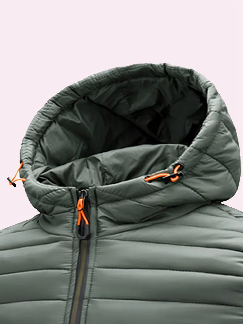 Women's warm winter puffer jacket, front view, showcasing hood and sturdy zipper closure.