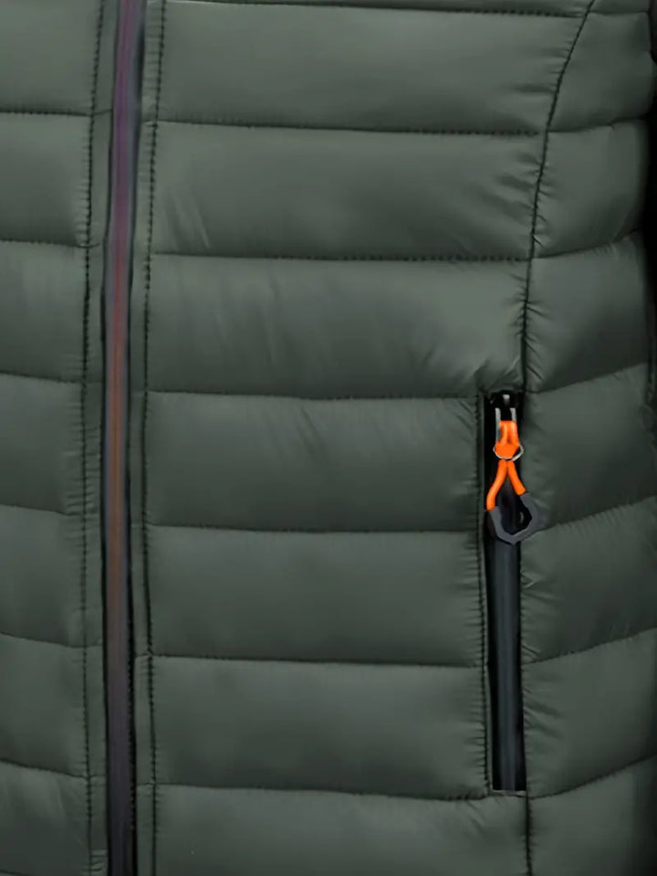 Stylish women's hooded puffer coat, side view, in navy for a complete winter look.