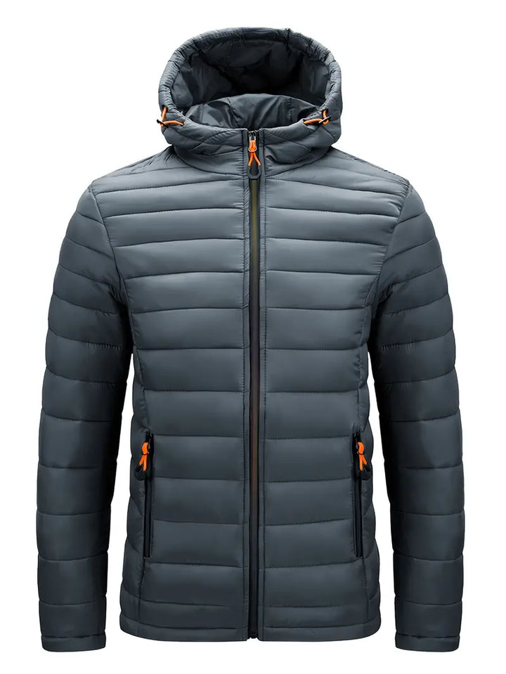 Women's insulated hooded puffer jacket on a model outdoors, showcasing fit and warmth.