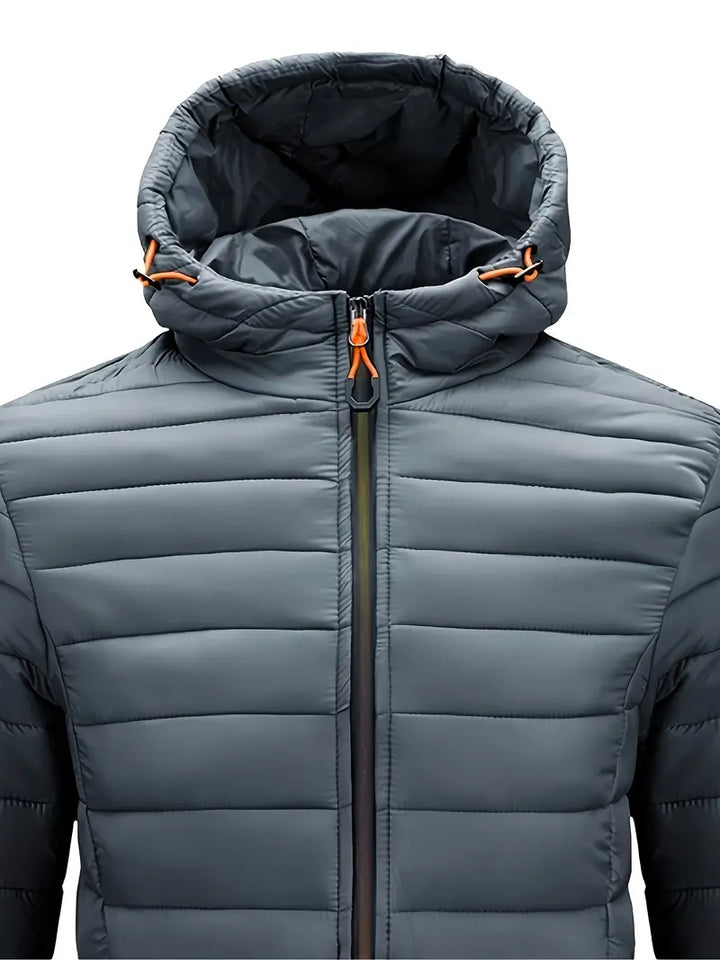Women's everyday hooded puffer jacket, in a casual setting, grey, comfortable and chic.