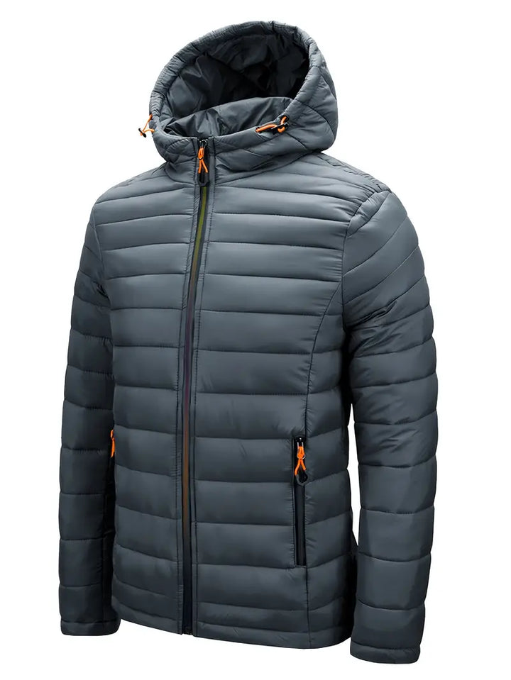 Active women's winter puffer jacket with hood, perfect for brisk walks and outdoor activities.