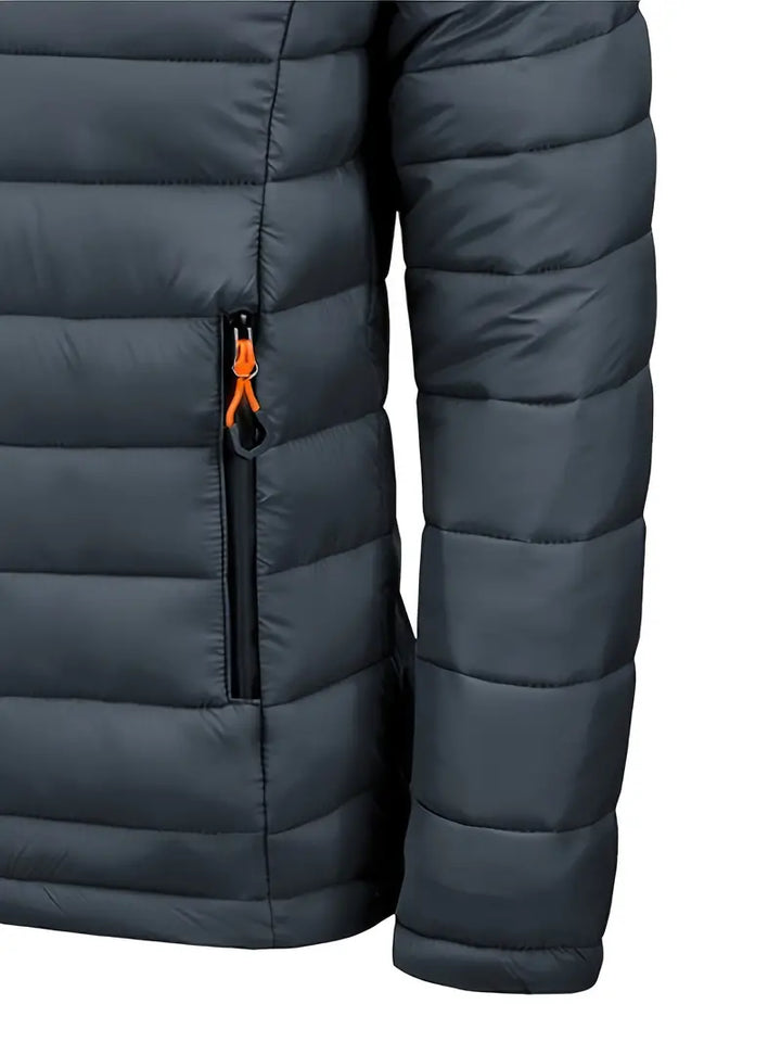 Women's warm puffer coat with hood, showcasing its quilted texture and maroon color.
