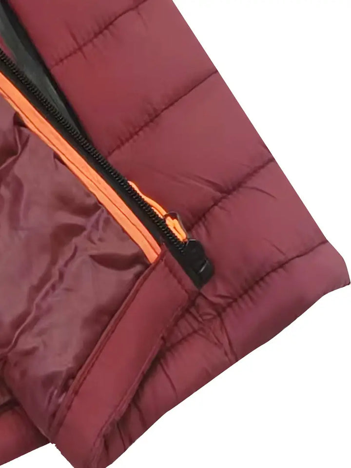 Women's lightweight insulated puffer jacket with hood, neatly folded for storage.