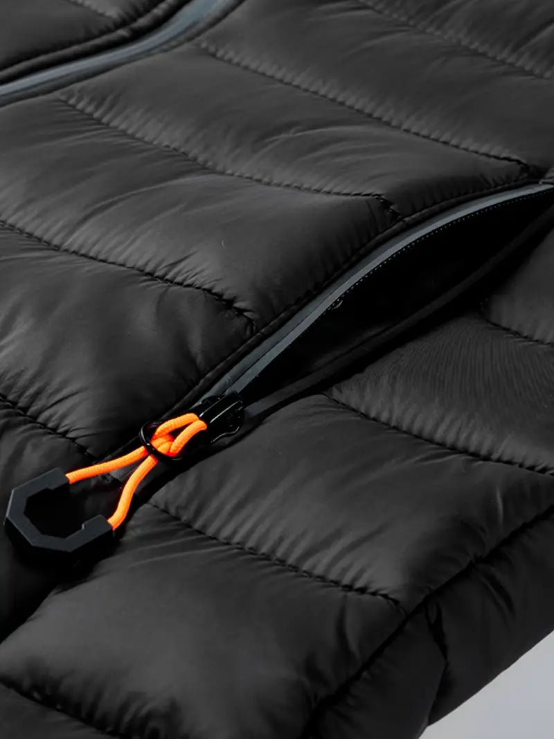 Insulated ladies winter jacket with hood, lightweight and fashionable, in a vibrant color.