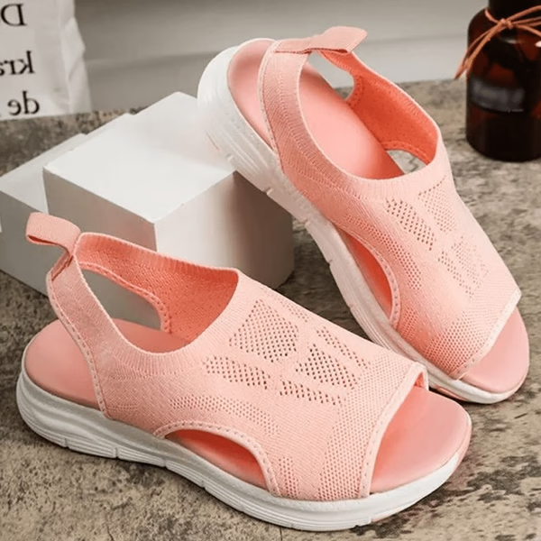 Profile view: Women's supportive orthopedic slingback slide sandals. Features arch support for all-day comfort.