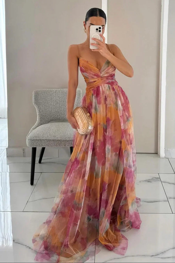 Women's watercolor floral maxi dress with elegant twist-front bodice, perfect for summer occasions & parties.