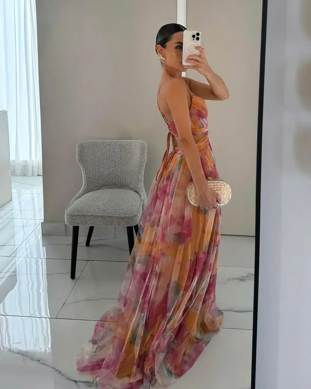 Flowy women's watercolor floral maxi dress, a stunning twist-front summer dress perfect for vacation & resorts.