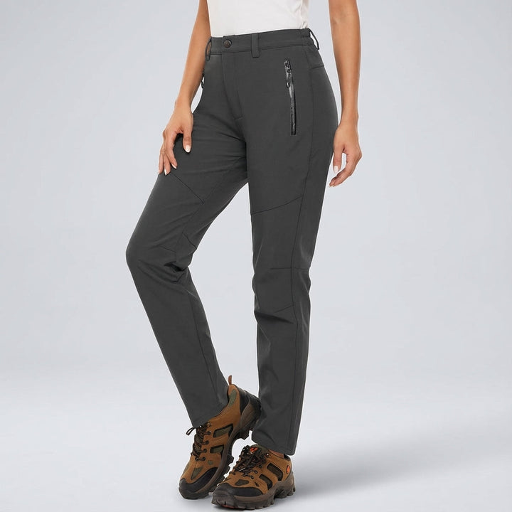 View of women's thermal outdoor pants, waterproof and fleece-lined for ultimate cold weather comfort