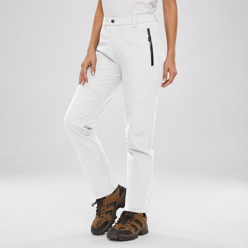 Pair of ladies' waterproof fleece-lined hiking pants, designed for warmth and protection in cold climates