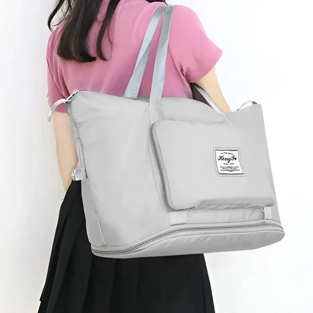 Lightweight & foldable women's travel duffle bag. Waterproof for gym, weekend trips, or extra luggage. Easy storage.