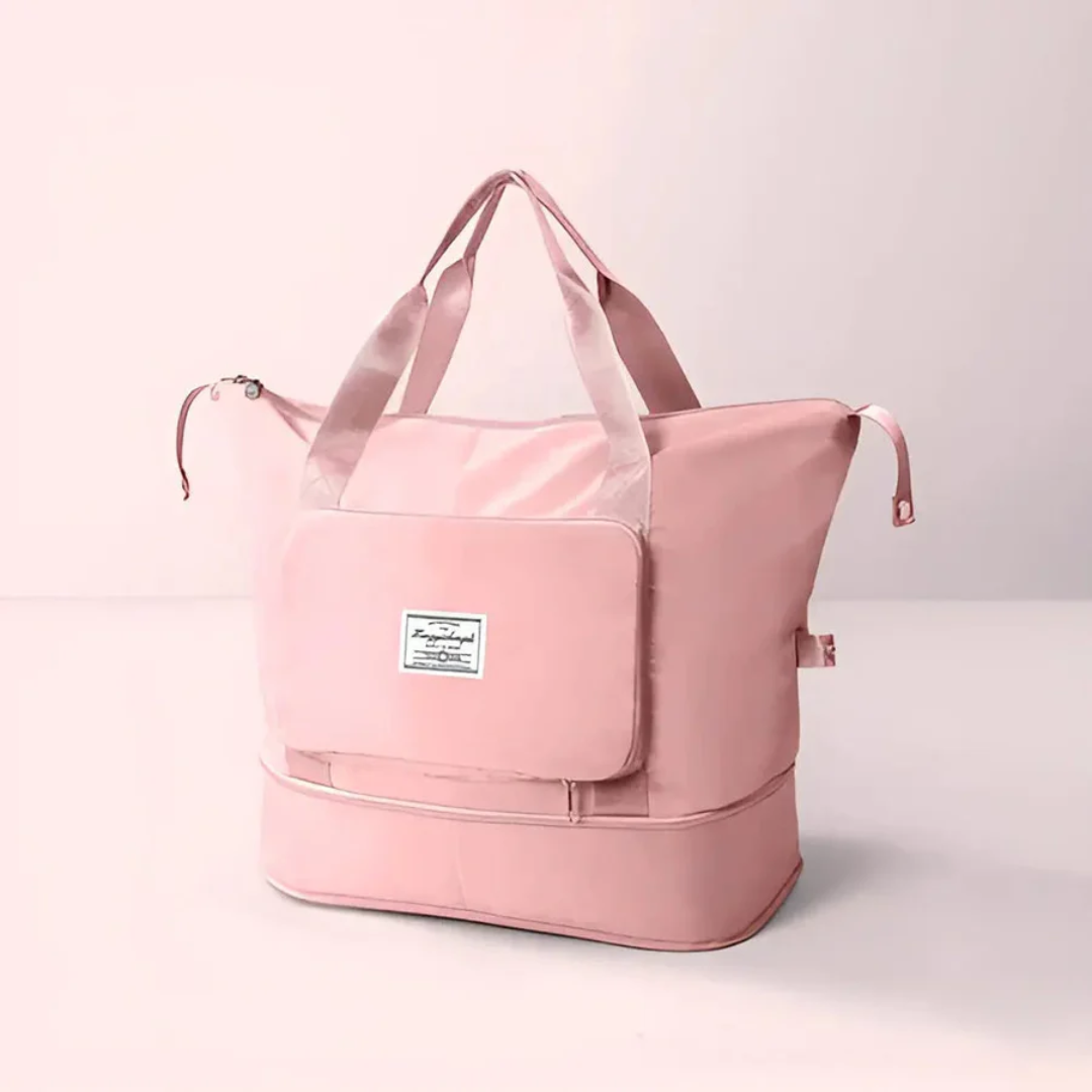 Sleek waterproof foldable duffle bag for women. Ideal for travel, gym, or weekend adventures. Compact & durable.