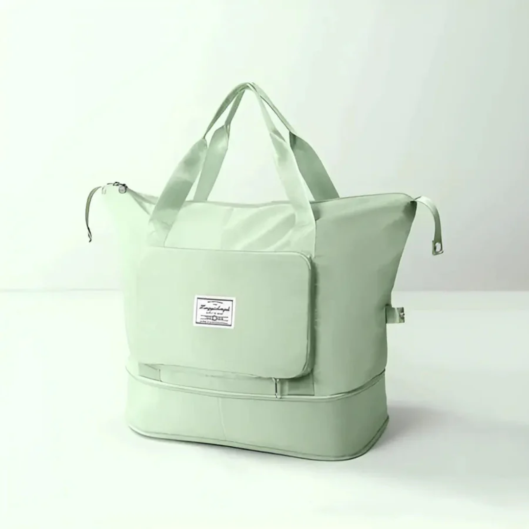 Foldable waterproof travel bag for women. Spacious yet compact, perfect as a versatile duffle for weekend & gym.