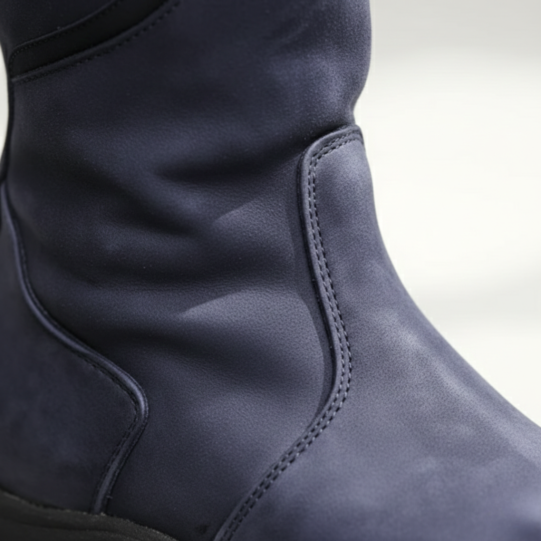 Black waterproof women's boots, knee-high with full zipper, rounded toe, offering ultimate orthopedic comfort.