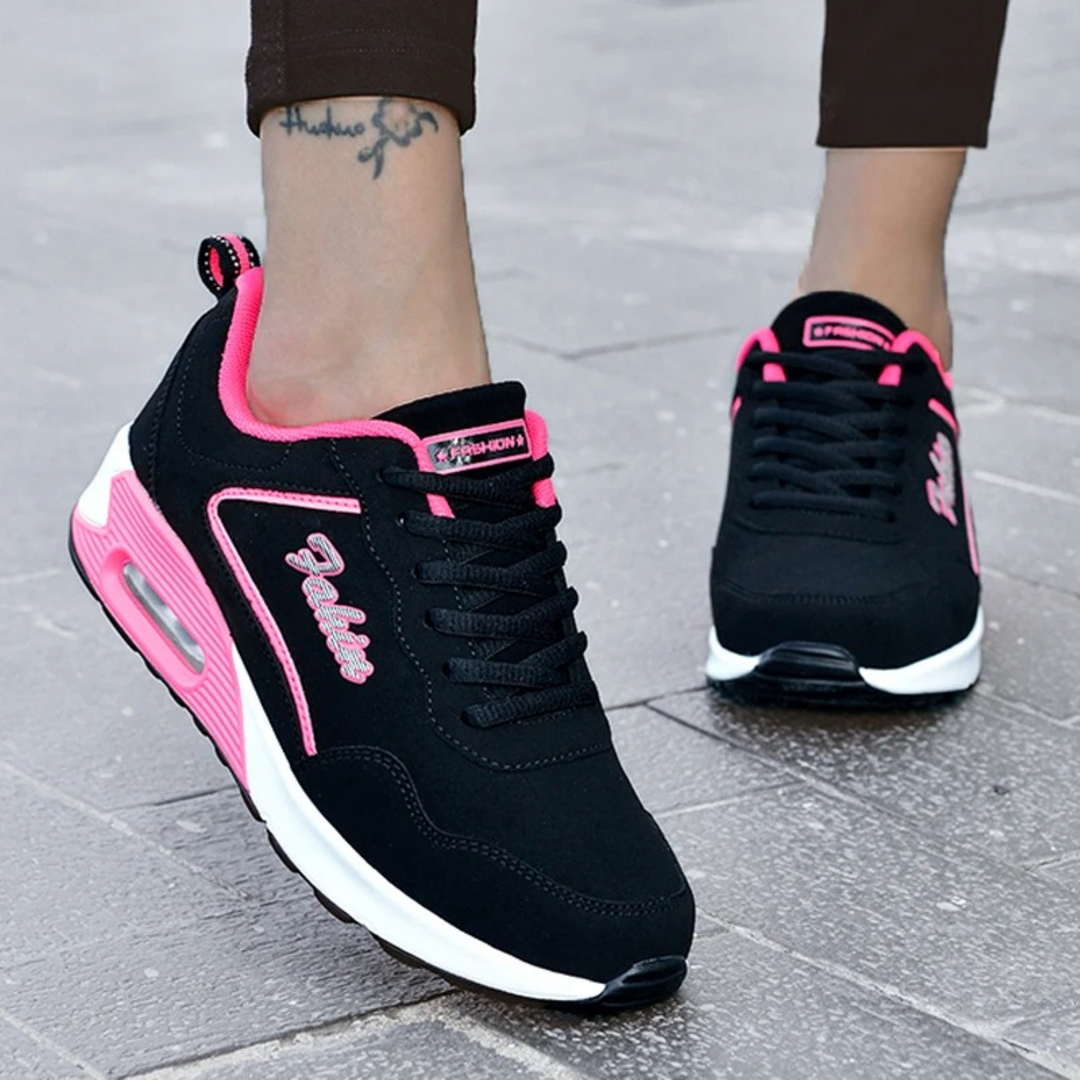 Lightweight women's hiking sneakers with waterproof protection for comfortable all-weather outdoor adventures & travel.