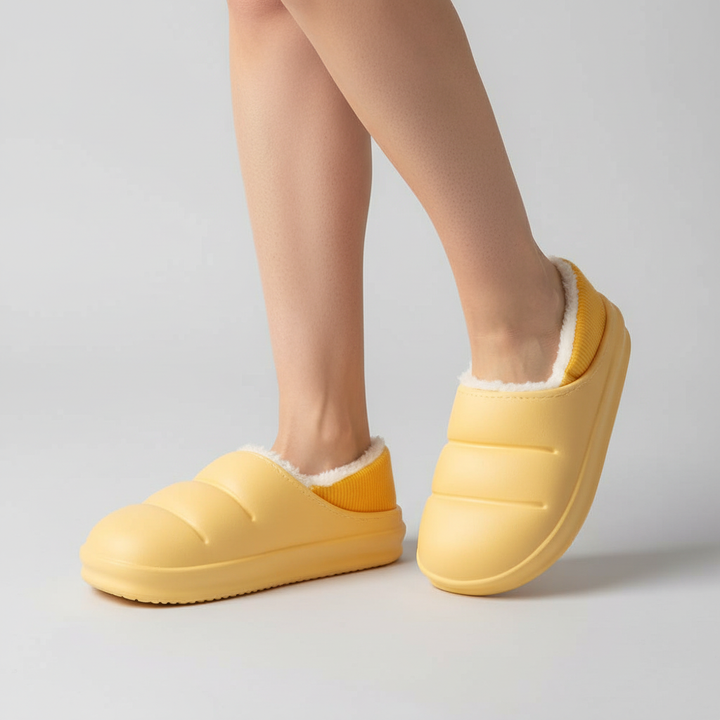 Cozy women's indoor footwear, waterproof and plush-lined for ultimate comfort