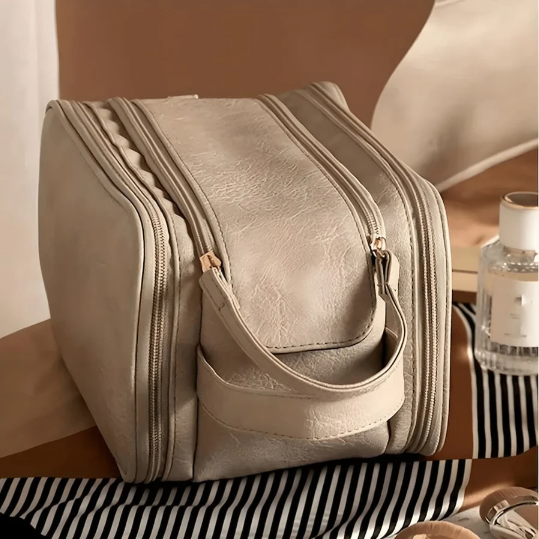 Women's waterproof makeup organizer travel bag. Durable cosmetic storage for beauty essentials on the go.