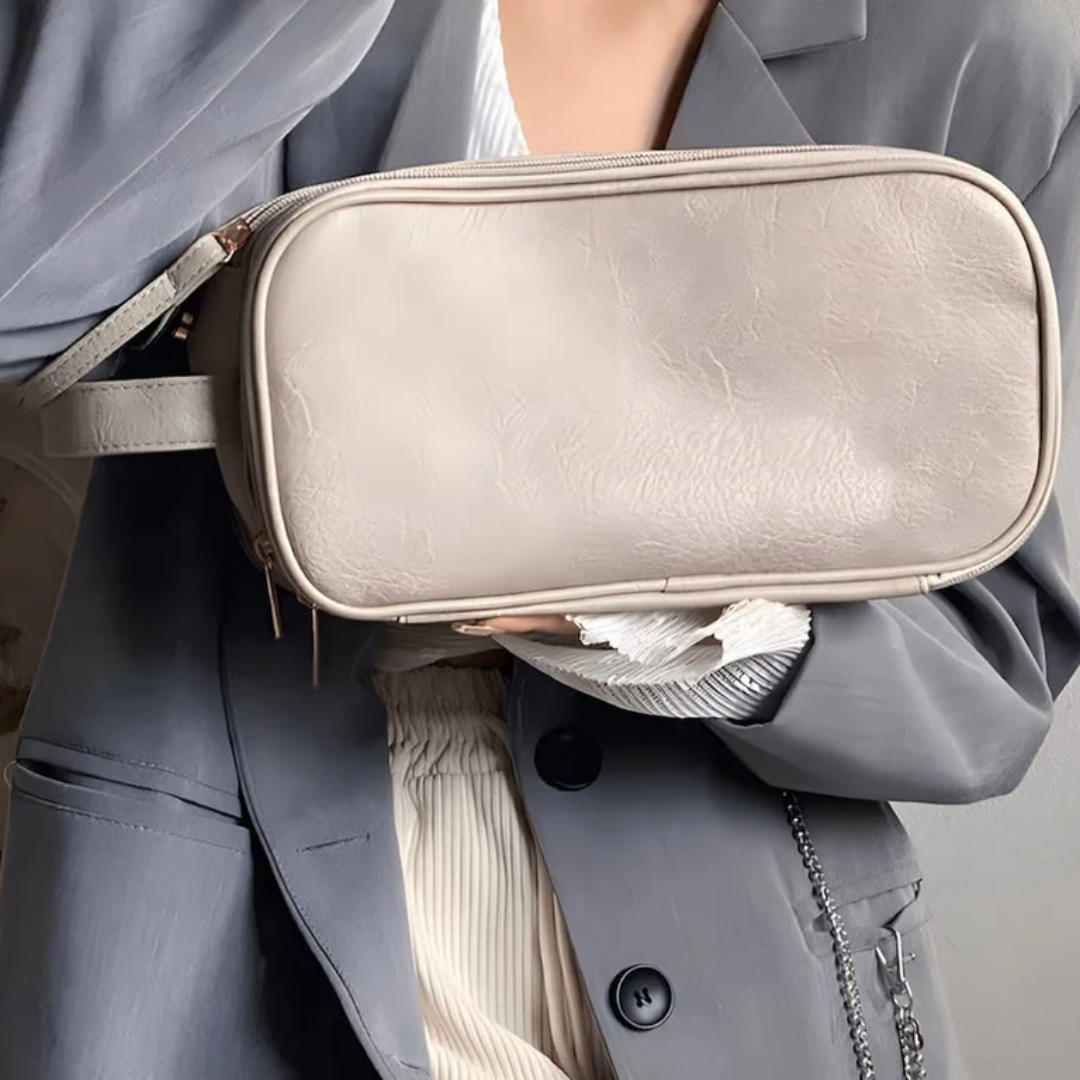 Stylish women's waterproof makeup organizer. Essential travel cosmetic bag for toiletries & beauty products.