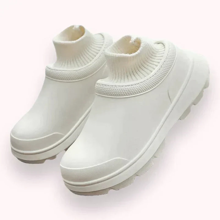 Women's waterproof slip-on clogs with knit ankle cuff. Comfortable, non-slip, versatile everyday footwear.