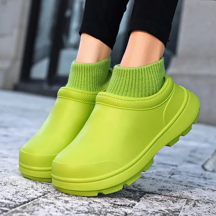 Detail shot of the waterproof upper on women's slip-on clogs, ensuring dry, comfortable feet.