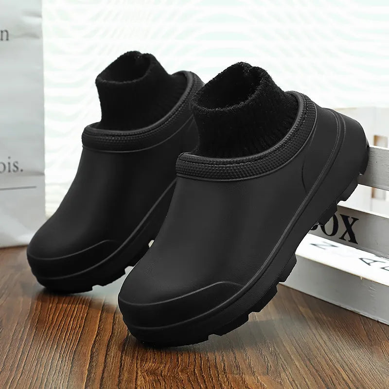 Angled view of "Madeline" women's waterproof clogs, emphasizing the secure knit cuff and easy slip-on.