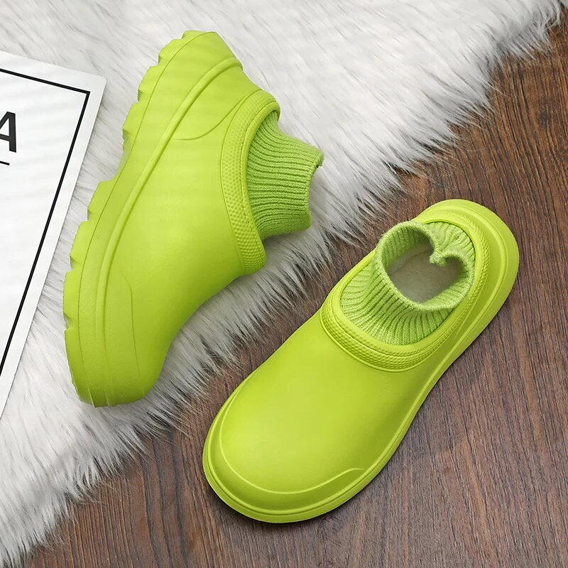 Front view of women's comfortable waterproof clogs, featuring easy slip-on design and durable material.