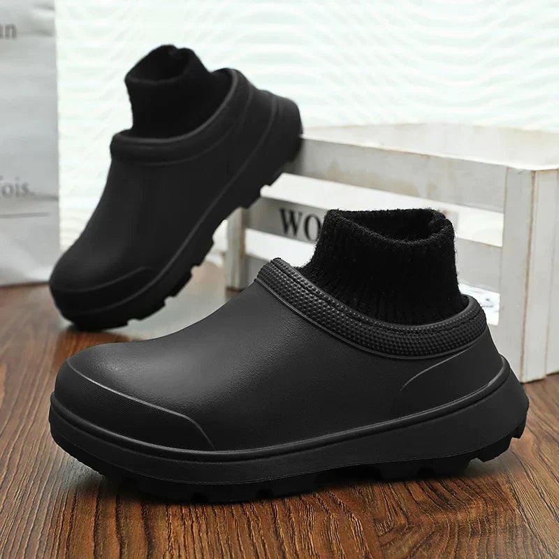 Bottom sole of non-slip waterproof women's clogs, ideal for walking and casual outdoor activities.