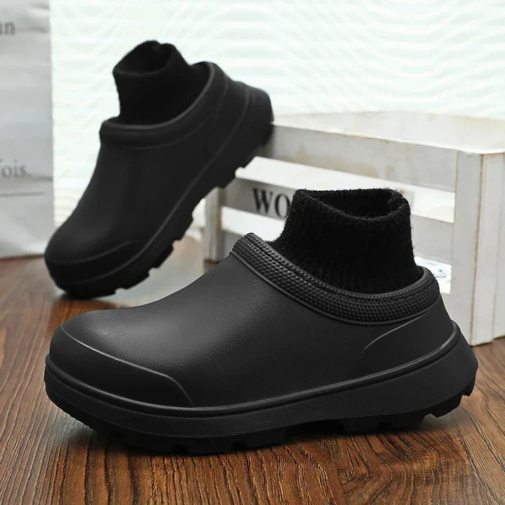Bottom sole of non-slip waterproof women's clogs, ideal for walking and casual outdoor activities.