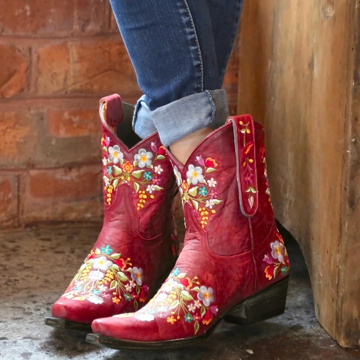 Stylish women's western boots with vintage charm & waterproof protection for outdoor adventures.