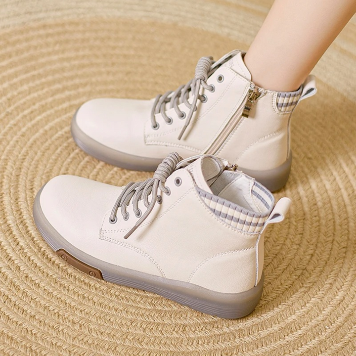 Durable women's waterproof sneakers with ergonomic support for all-day walking comfort. Non-slip, all-weather footwear.