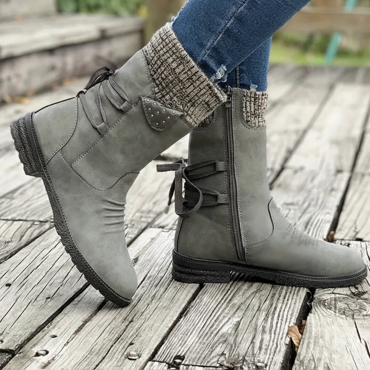 Fleece-lined women's winter boots, providing warmth and waterproof protection on snow