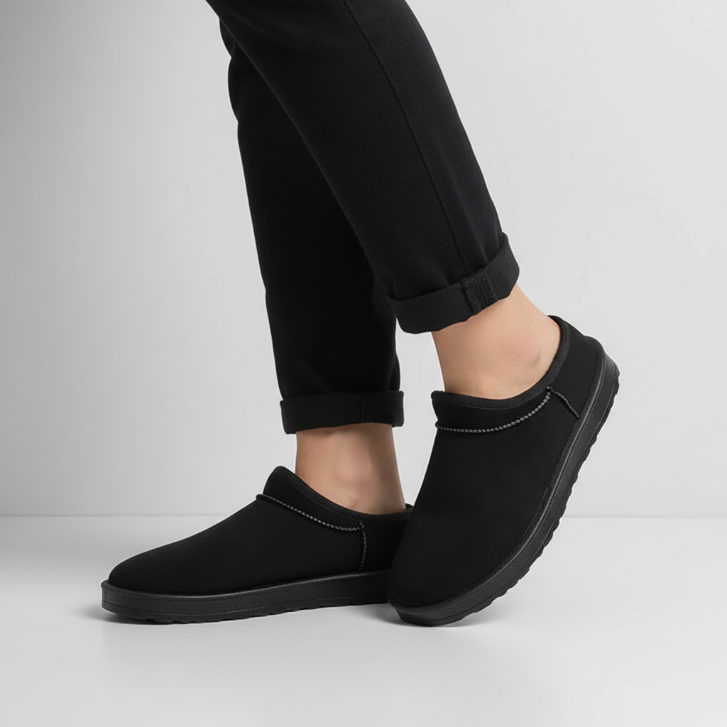 Stylish women's warm winter slippers with waterproof exterior and cozy plush interior