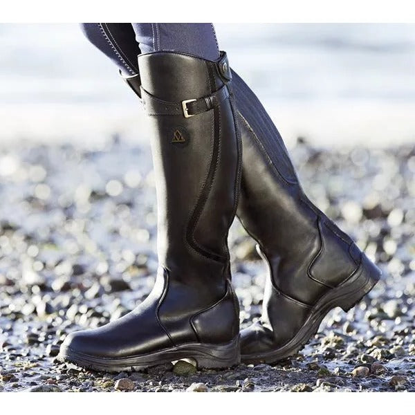 Comfortable women's waterproof winter boots with non-slip sole, ideal for all-weather outdoor adventures.